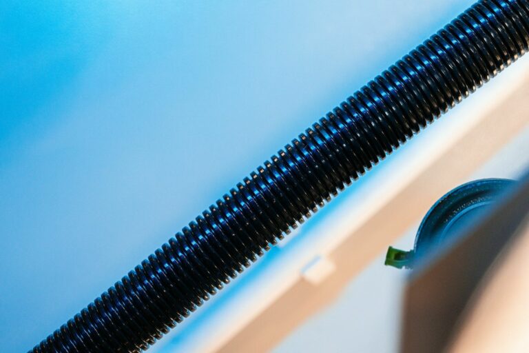 Close up of a plastic corrugated hosepipe in industrial factory